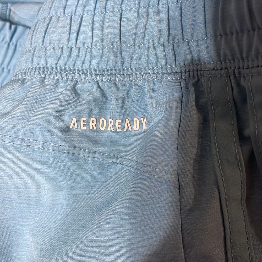 Blue Adidas athletic shorts